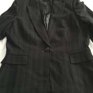 Women’s black stripped Tahari suit